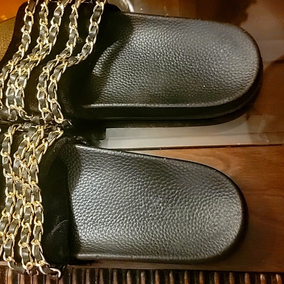 Black slides with gold chains across the top. Size 9 - Picture 7 of 7